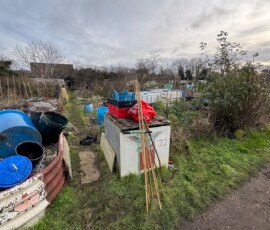Rubbish left on a vacated plot
